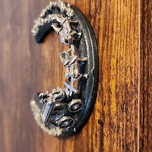 St Croix Forged Pweter Horseshoe with a Coach and Horses.